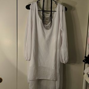 White long sleeved high low top